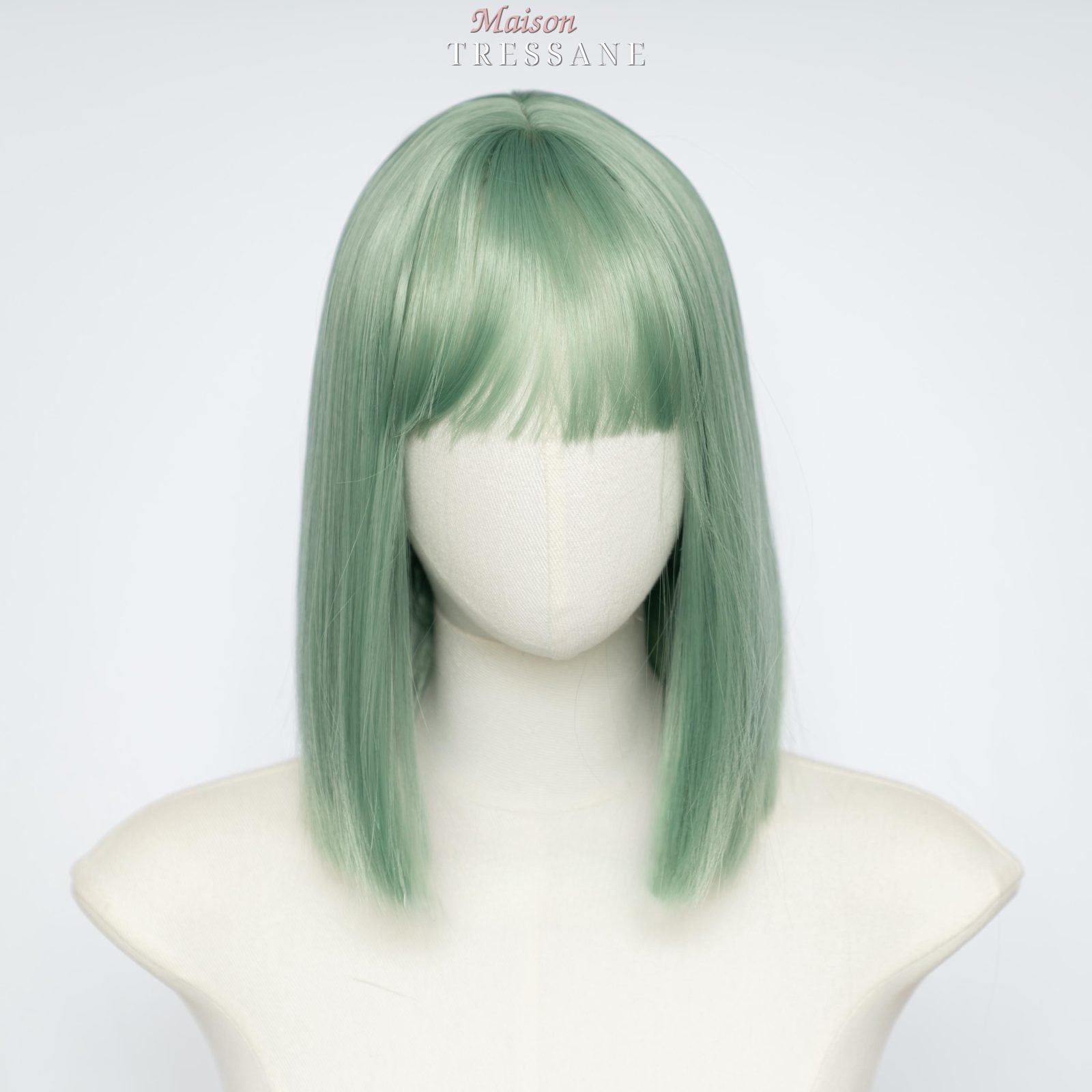 Perruque bob vert menthe avec frange — lisse, 25 cm, teinte vert — vue de face