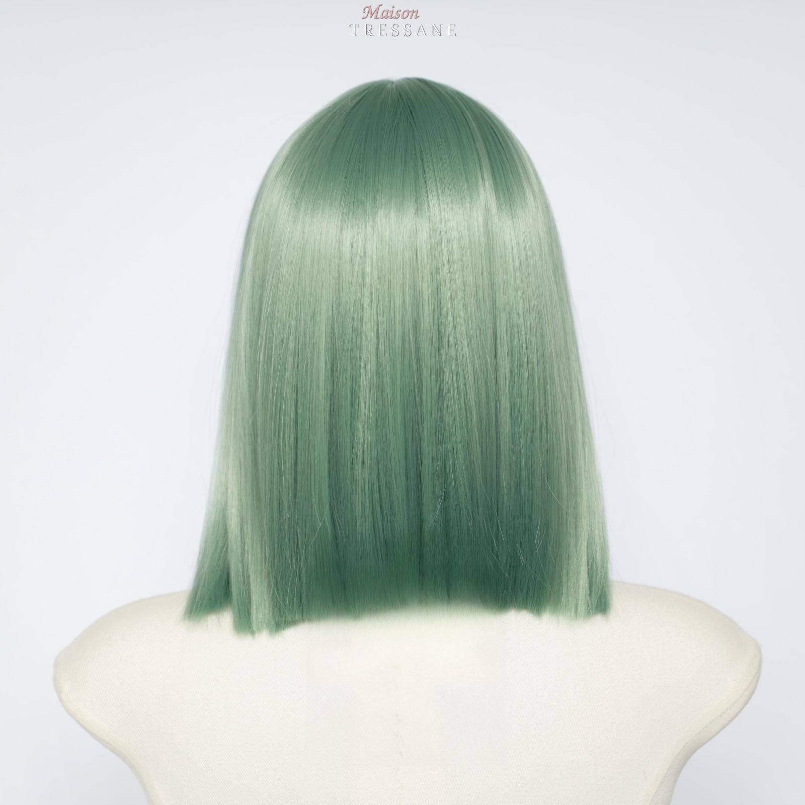 Perruque bob vert menthe avec frange — lisse, 25 cm, teinte vert — vue de dos