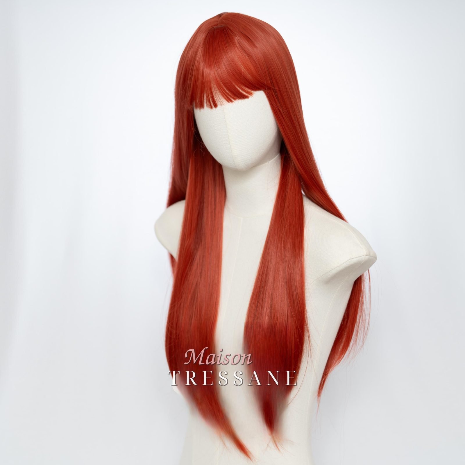 Perruque droite rousse 24 pouces avec frange — lisse, 60 cm, teinte cuivre & orange — vue de trois quarts