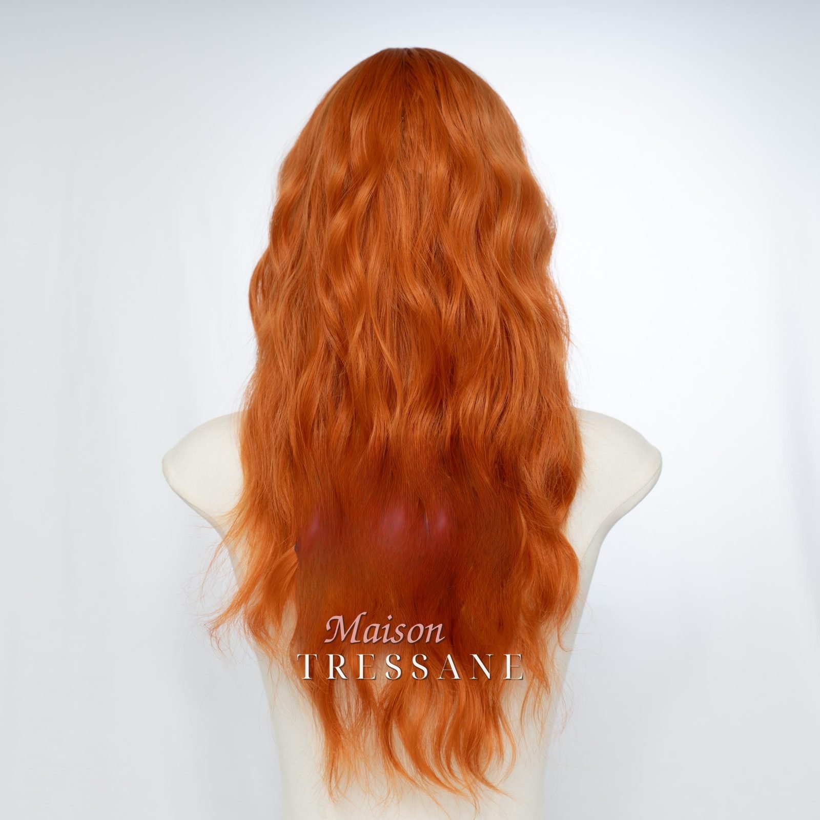 Ondulée 24 pouces orange cuivré avec frange — ondulée, 60 cm, teinte auburn — vue de dos