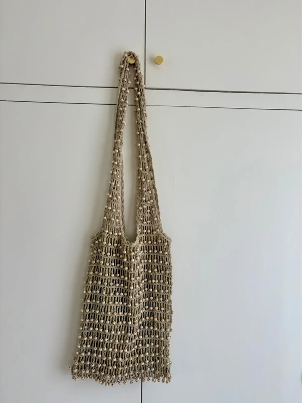 Sac beige à perles