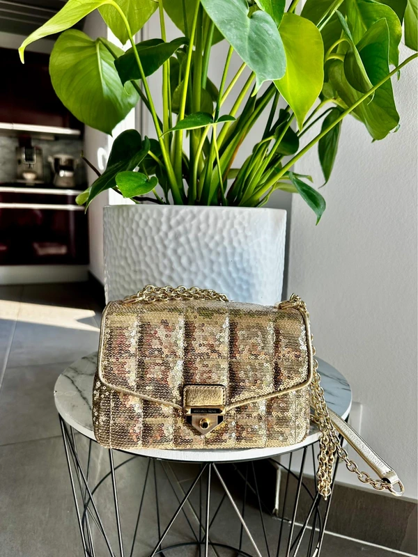 Sac Michael Kors doré à sequins