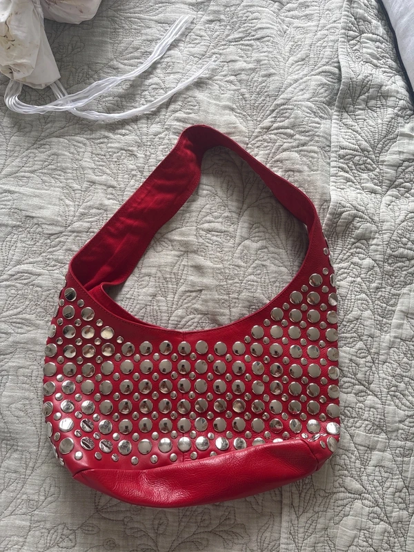 Red leather bag with studs