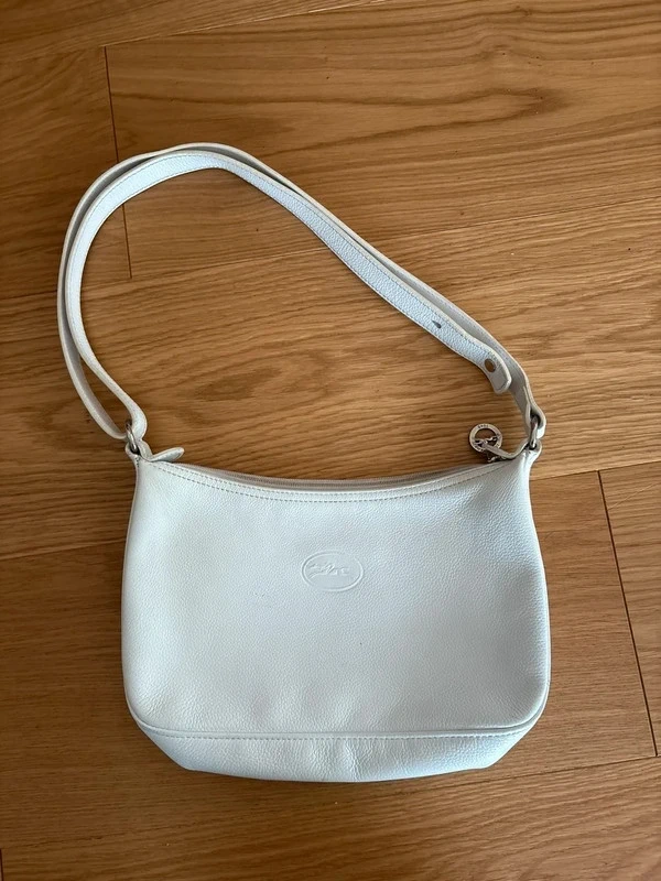 Très jolie sac longchamps